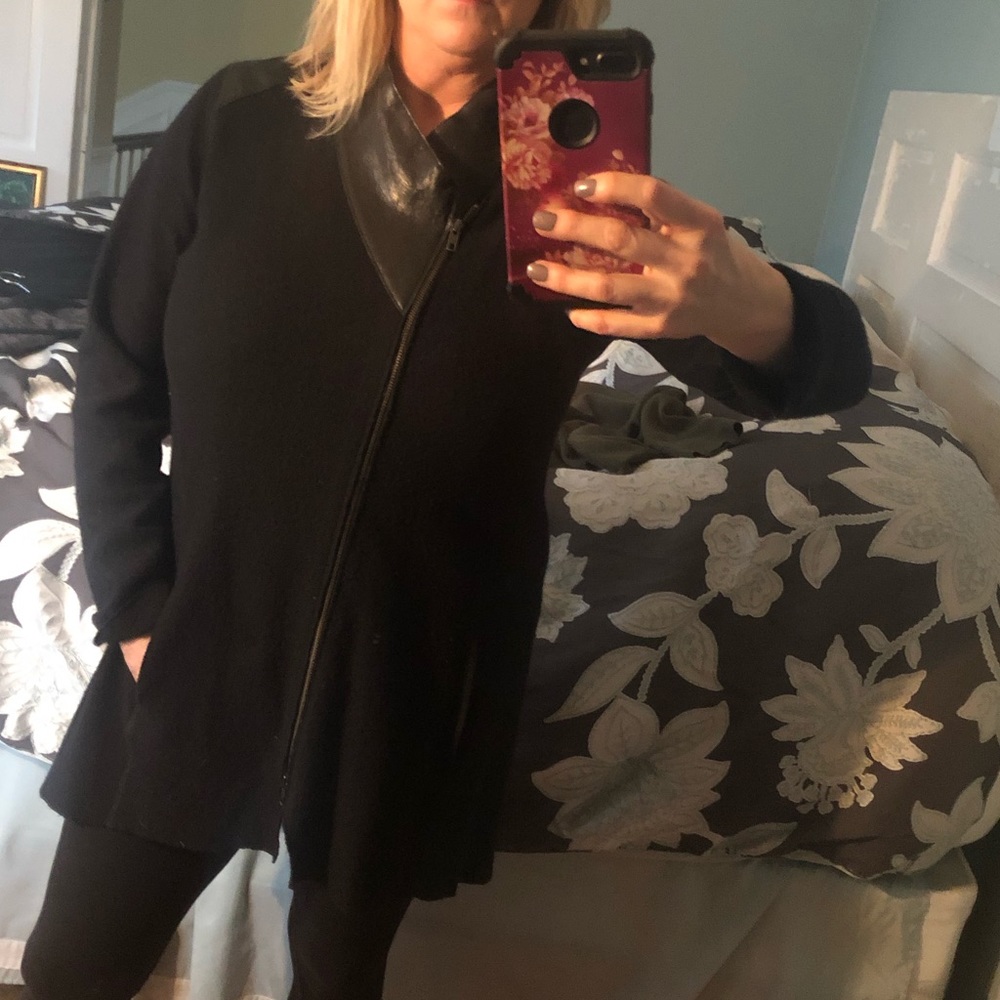 Runs true to size/zips from the top and the bottom